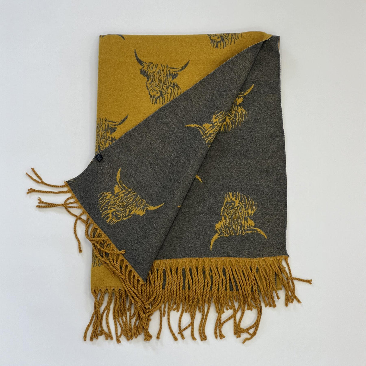 House of Tweed Reversible Highland Cow Print Scarf - Just £14.99! Shop now at Warwickshire Clothing.