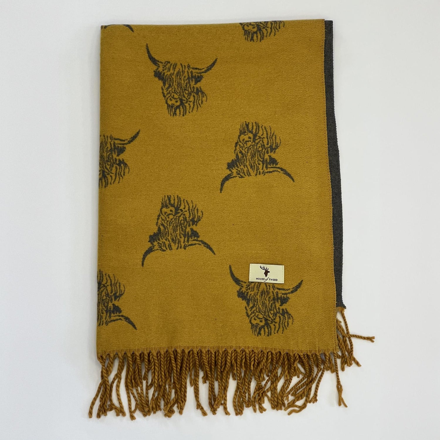 House of Tweed Reversible Highland Cow Print Scarf - Just £14.99! Shop now at Warwickshire Clothing.
