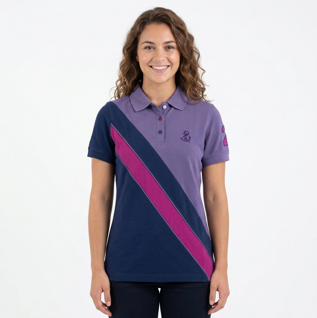 Woman wearing a purple and navy striped polo shirt on a white background