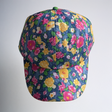 Hazy Blue Summer Breeze Floral Cap - Adjustable Velcro Back - Just £9.99! Shop now at Warwickshire Clothing.