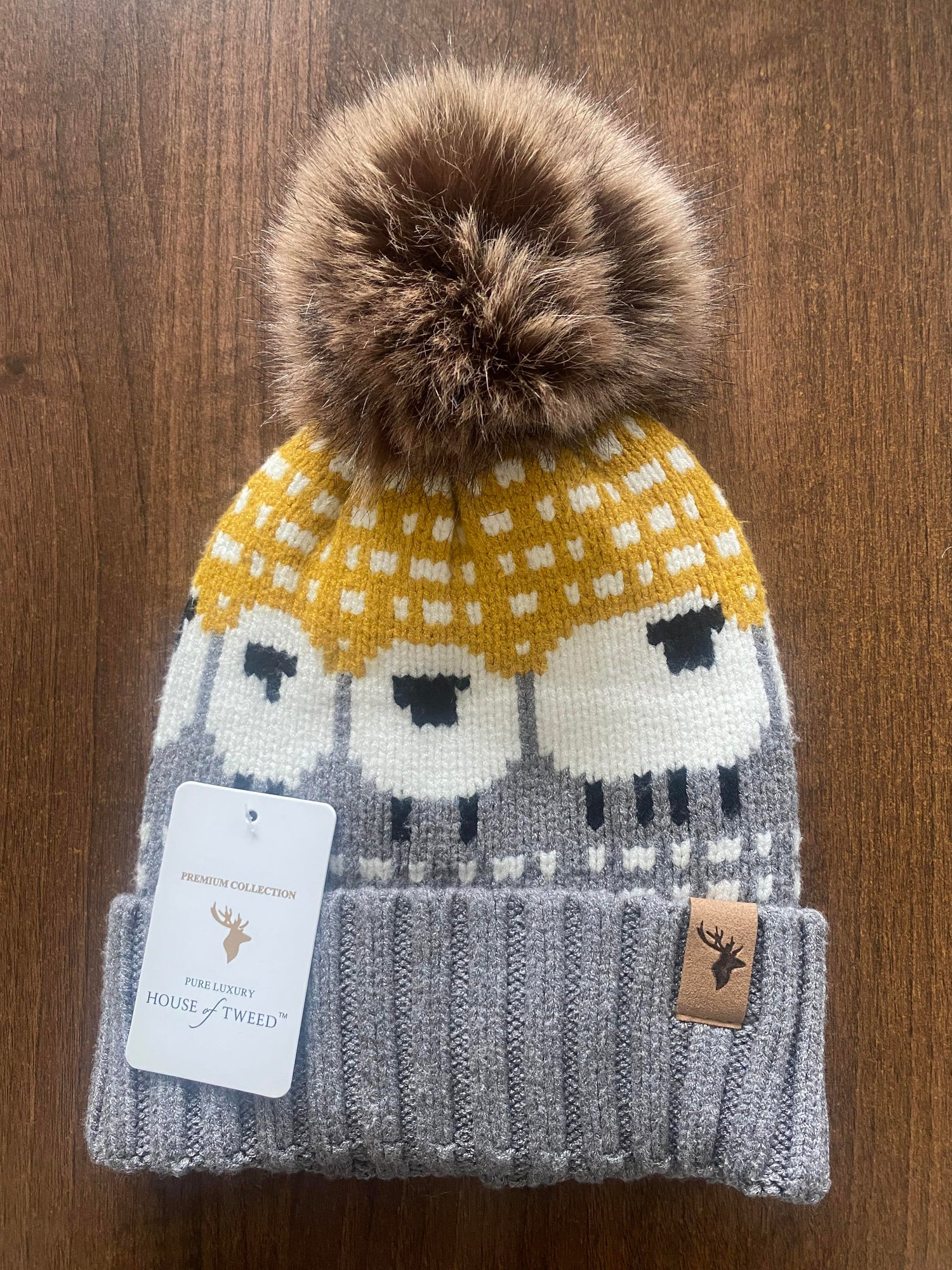 House Of Tweed Luxury Animal Print Pom Pom Beanies - Just £14.99! Shop now at Warwickshire Clothing.
