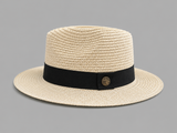 Beige straw hat with a black band on a gray background