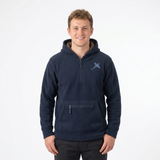 Man wearing a navy blue pullover with a logo on a white background