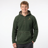 Man wearing a green pullover with a logo on a white background