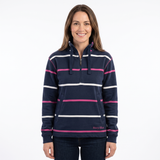 A woman modeling a navy blue half-zip hoodie with horizontal white and pink stripes, featuring a drawstring hood and a front kangaroo pocket, set against a plain white background.