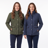 Two women modeling quilted jackets side by side against a plain white studio background. The woman on the left wears an olive green quilted jacket with dark navy pants, and the woman on the right wears a navy blue quilted jacket with dark navy pants.