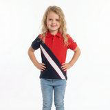 Young girl wearing a red and navy striped polo shirt with blue jeans on a white background