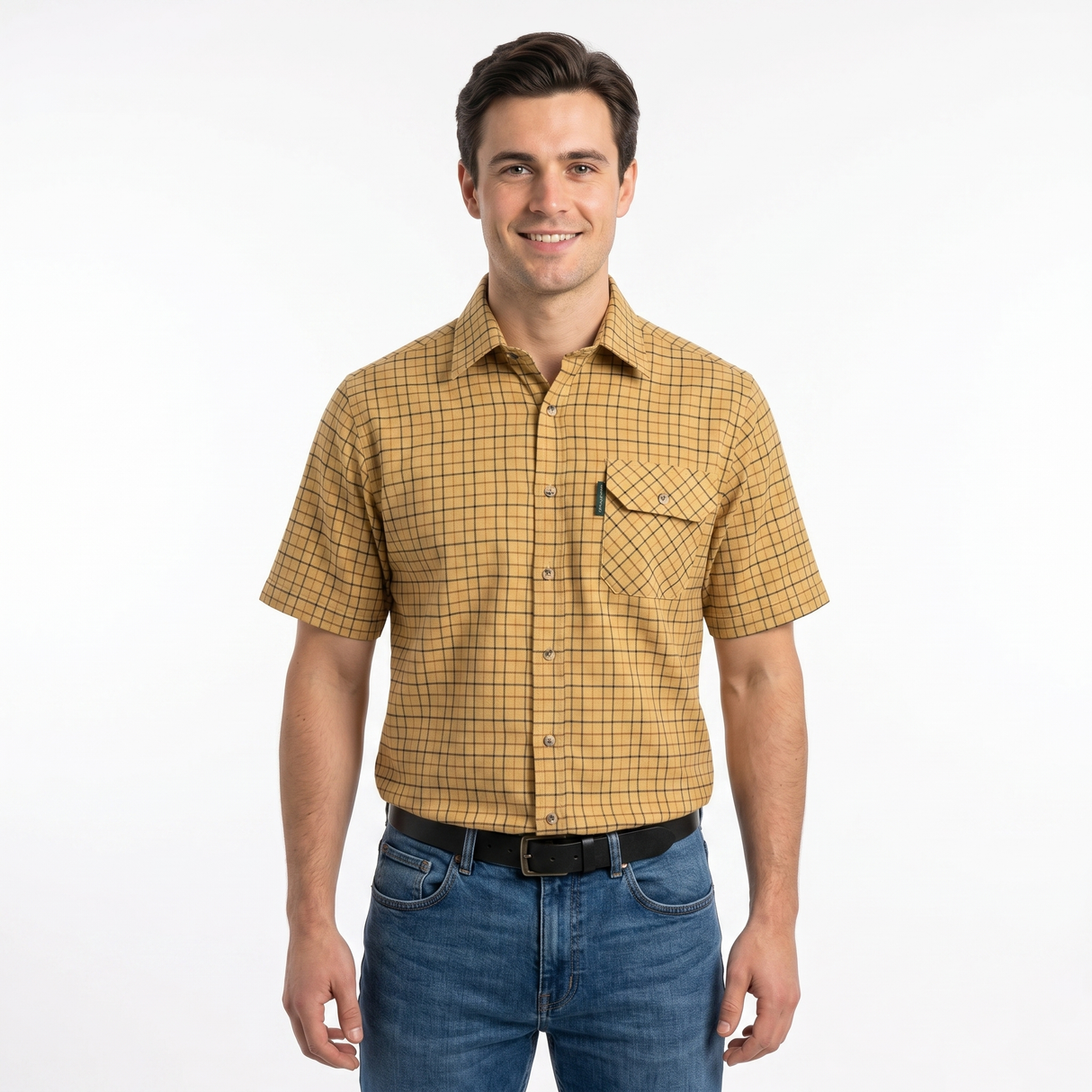 Man wearing a yellow plaid shirt and blue jeans on a white background