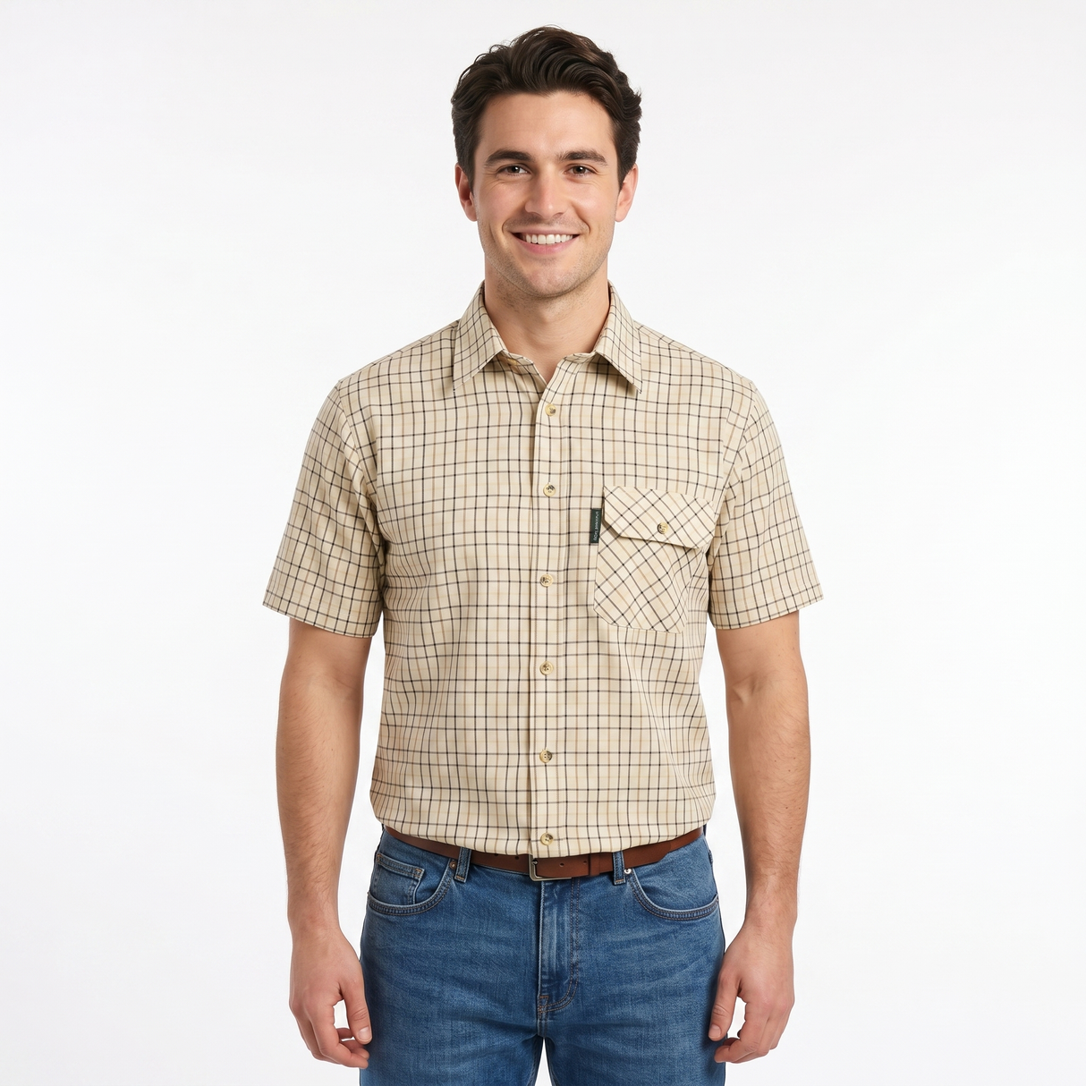 Man wearing a plaid short-sleeve shirt and jeans on a white background
